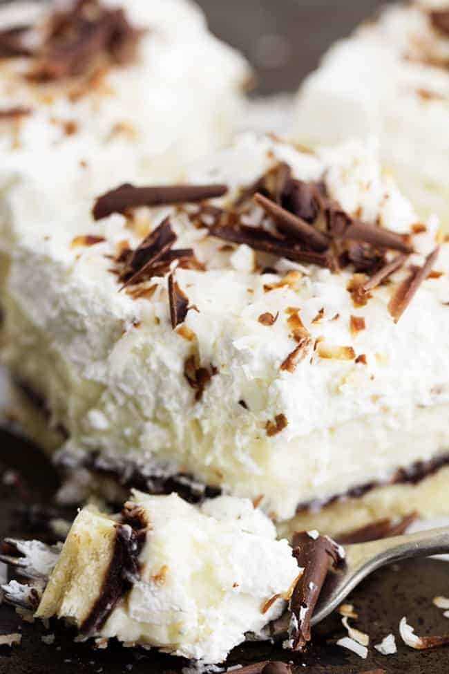 chocolate coconut cream pie bar bite on a fork.