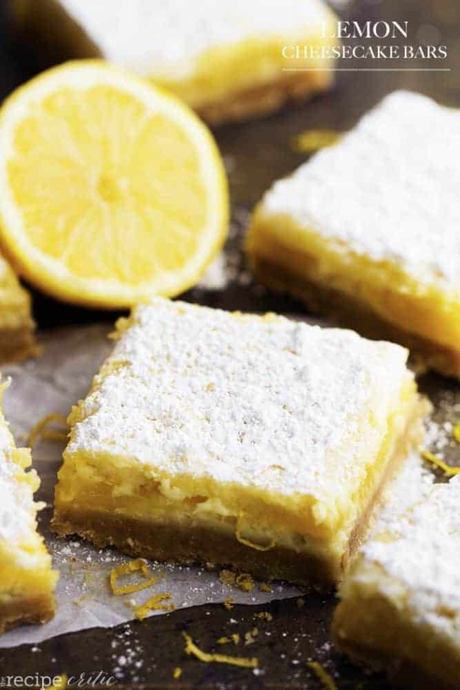 lemon cheesecake bars on a tray.
