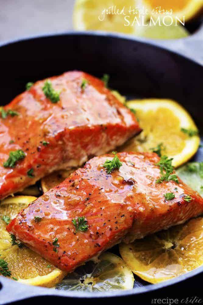 grilled triple citrus salmon in a skillet.