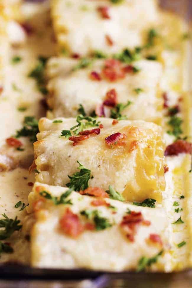 Close up on finished bacon alfredo roll ups.