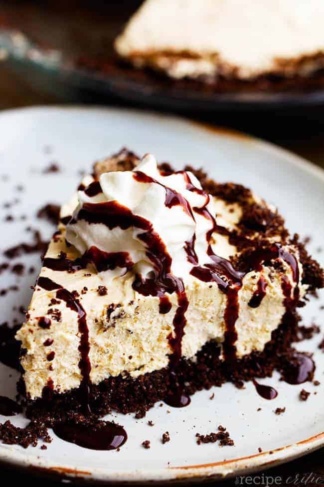 No bake cream cheese peanut butter pie on a white plate.