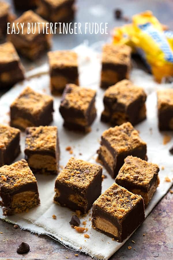 Butterfinger fudge mini squares on a tray.