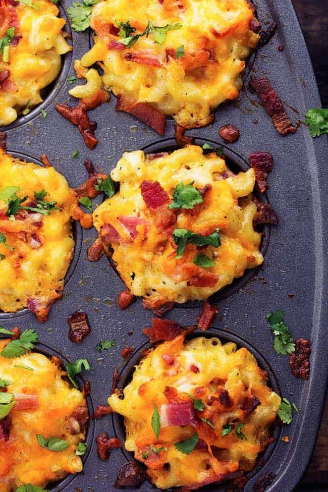 mac and cheese cups in a muffin tray.