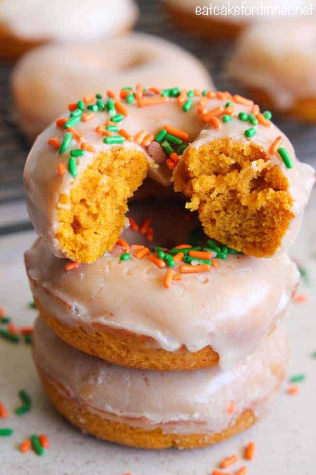 Baked Pumpkin Donuts with Browned Butter Glaze in a stack.