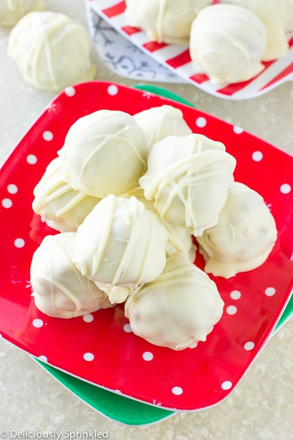 White Chocolate Almond Truffles on a red and white polka dot plate.