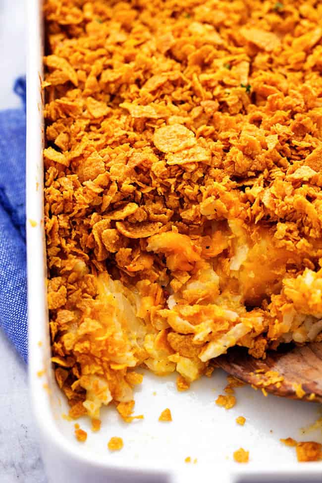 funeral potatoes in a white baking dish.