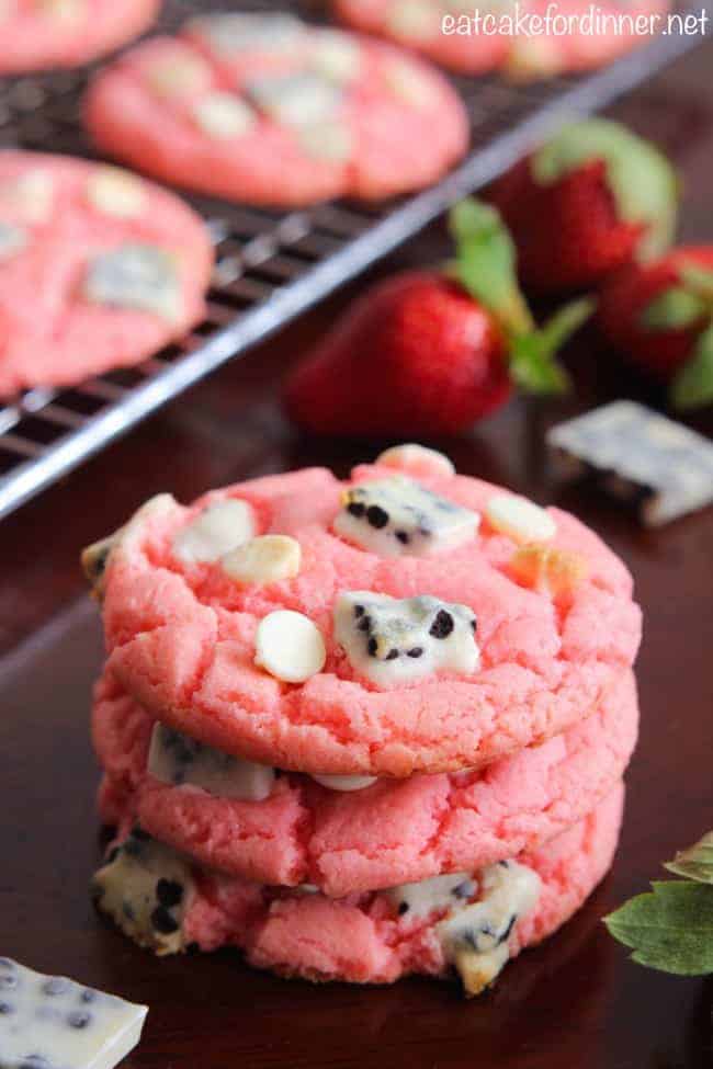 Strawberry Cookies 'n Cream Cookies with whole fresh strawberries in background