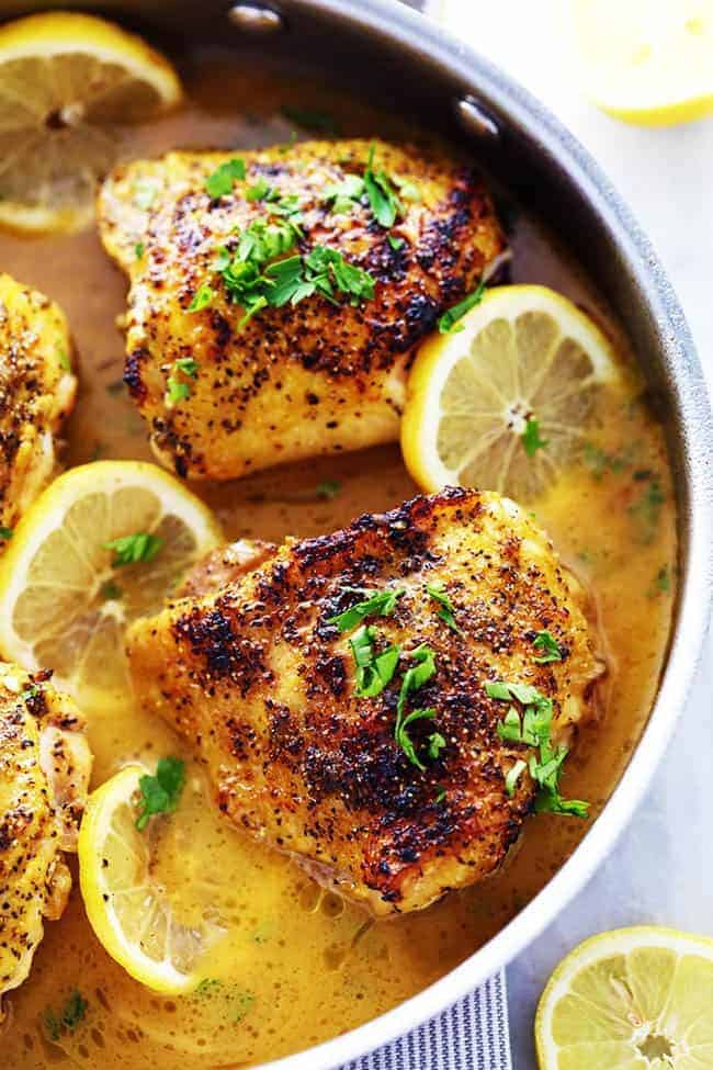 Close up of Lemon Pepper Chicken with a Brown Butter Garlic Lemon Sauce in a large pan. 