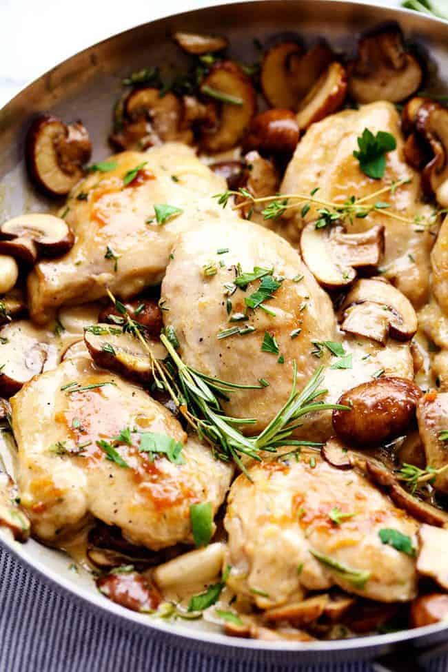 Creamy Garlic Herb Mushroom Chicken in a frying pan. 