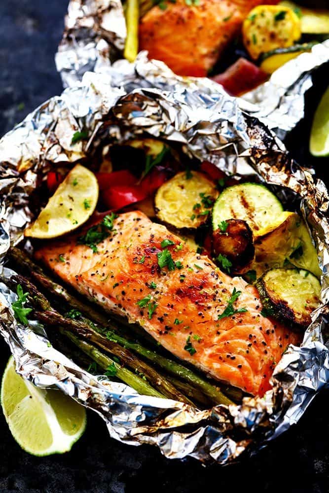 Lime Butter Salmon in Foil with Summer Veggies with fresh lemon on the side. 