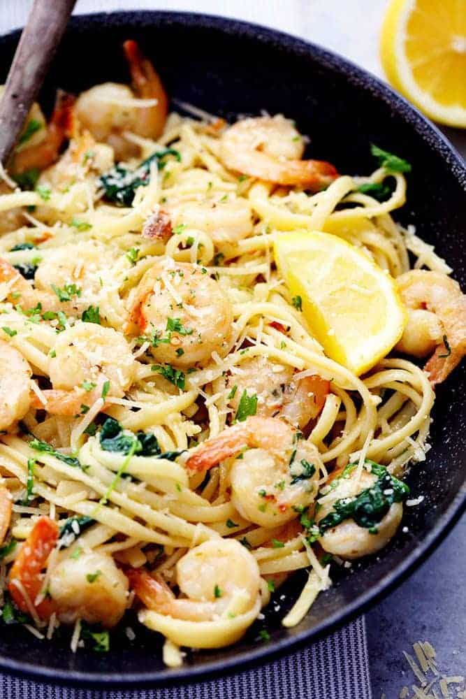 Lemon Garlic Parmesan Shrimp Pasta in a large black skillet. 