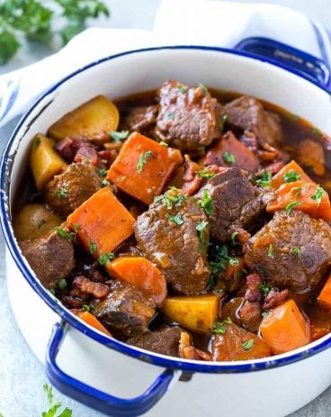 This beef stew is full of tender meat, colorful veggies and plenty of smoky bacon. A one pot meal that's perfect for cold weather!
