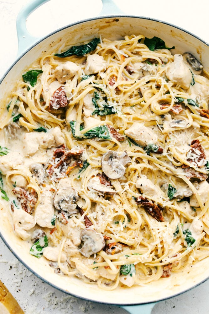 One pot of chicken mushroom Florentine in a skillet. 