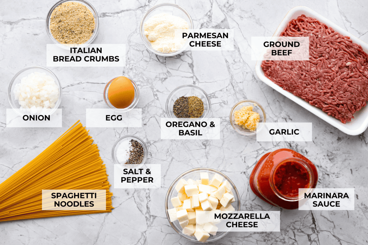 Mozzarella Stuffed Meatballs take classic meatballs to the next level! Tender and juicy with melty cheese on the inside. Serve these meatballs as a party appetizer or over spaghetti noodles for a hearty meal! Ingredients listed to make mozzarella stuffed meatballs.