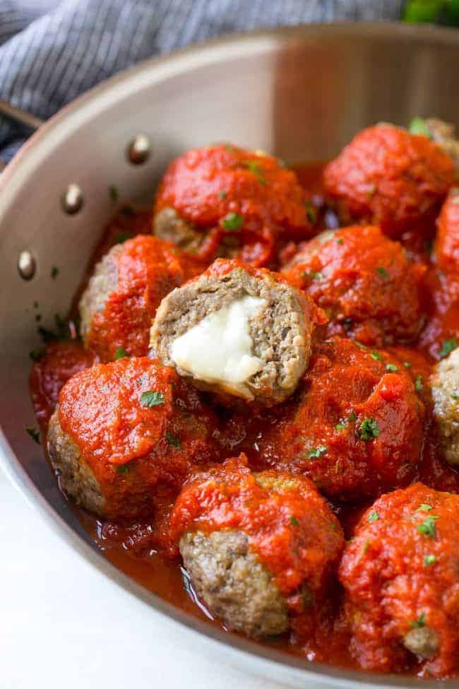 These mozzarella stuffed meatballs are a fun twist on the classic recipe - serve these meatballs as a party appetizer or over a big plate of spaghetti for a hearty meal!