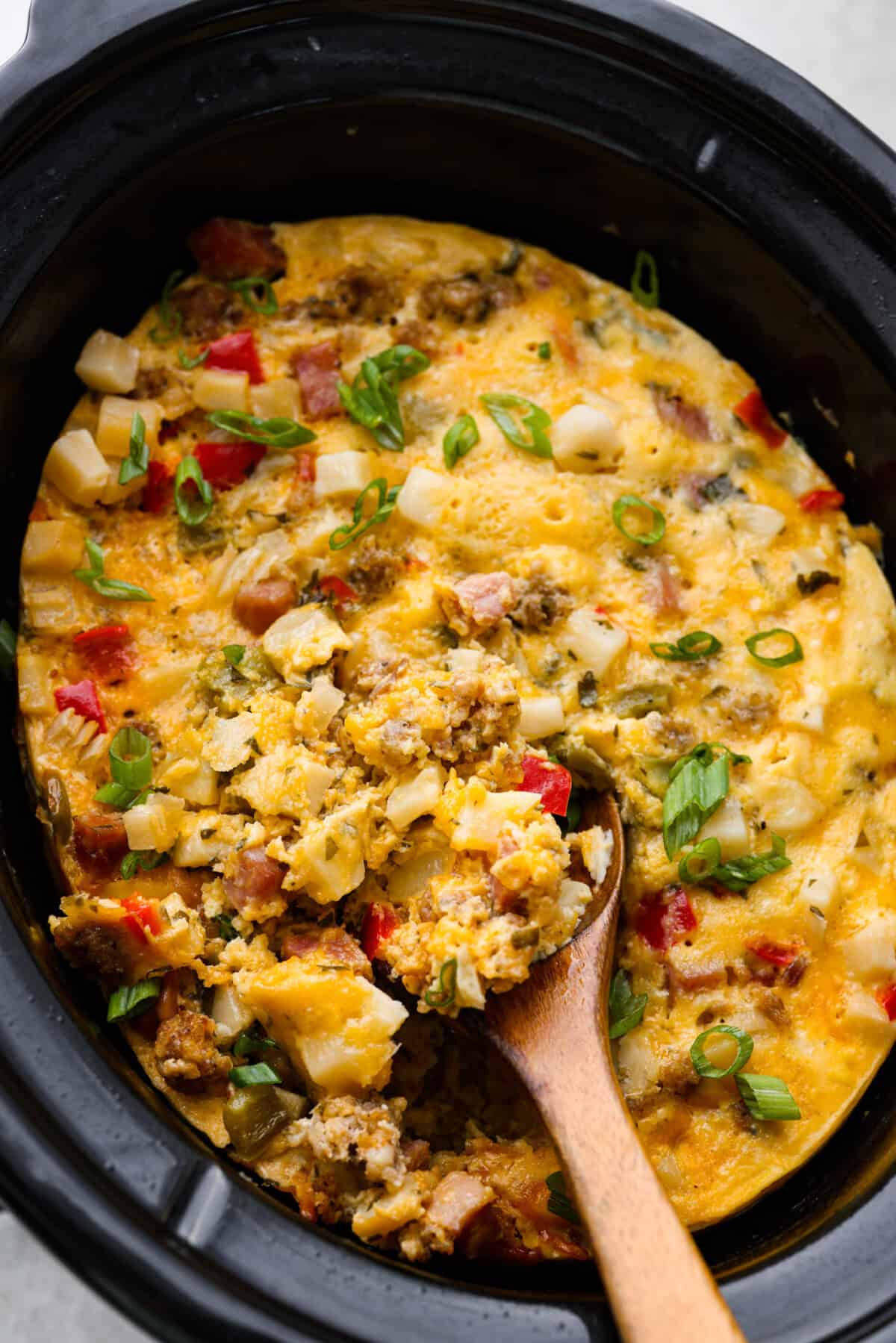 Overhead shot of slow cooker breakfast casserole in the crock pot. 