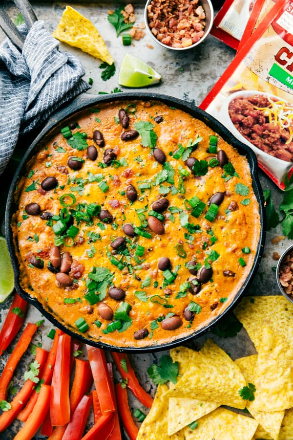 Spicy Kielbasa Chili Dip finished in a black skillet.