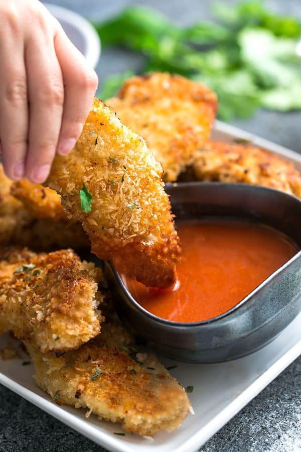 Oven Fried Chicken with red dipping sauce