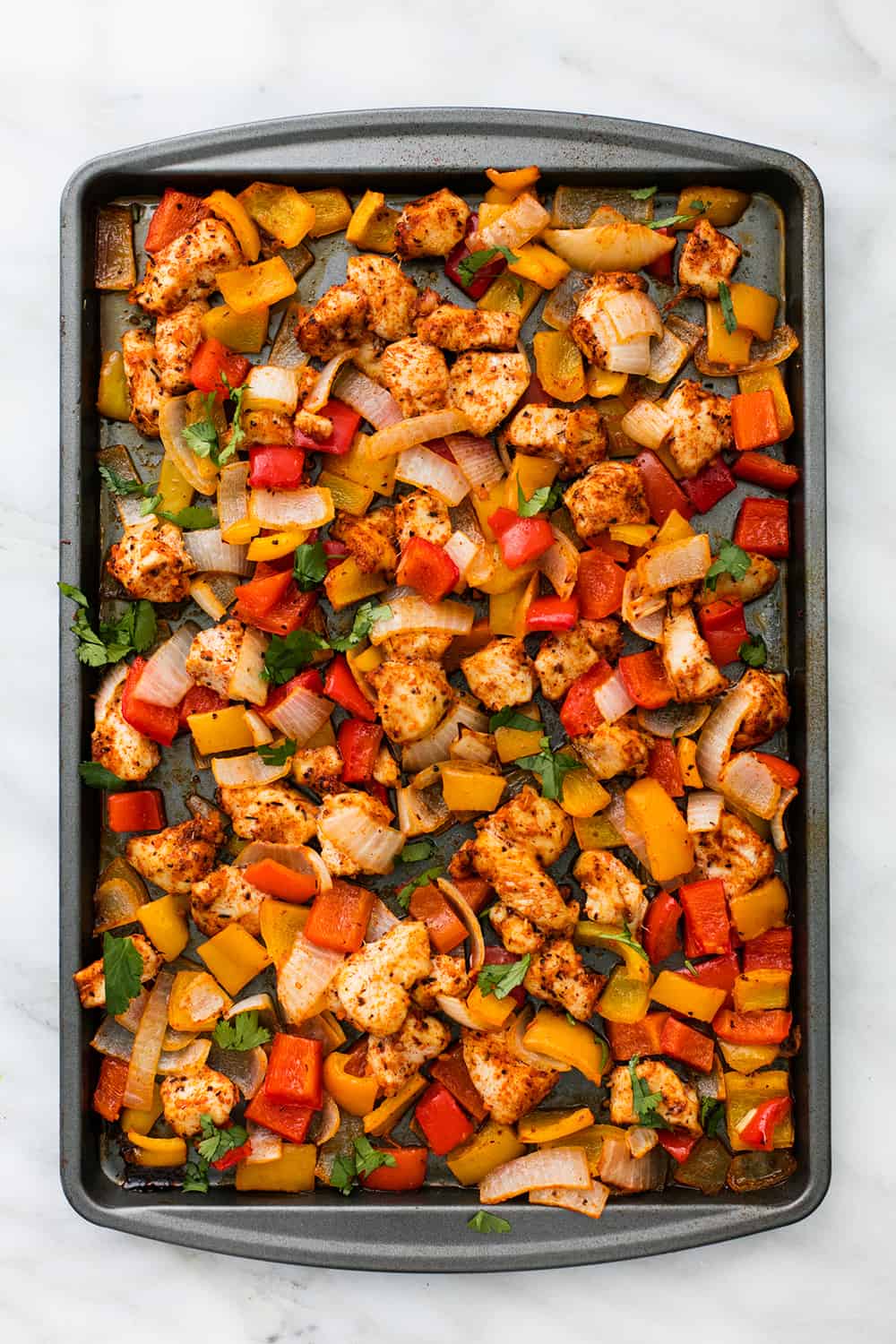 Areal view of a sheet pan cajun chicken.