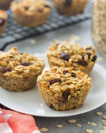 These Carrot Cake Baked Oatmeal Cups are super simple -- a great on the go breakfast, lunch or snack! Packed with fiber and protein and low in calories.
