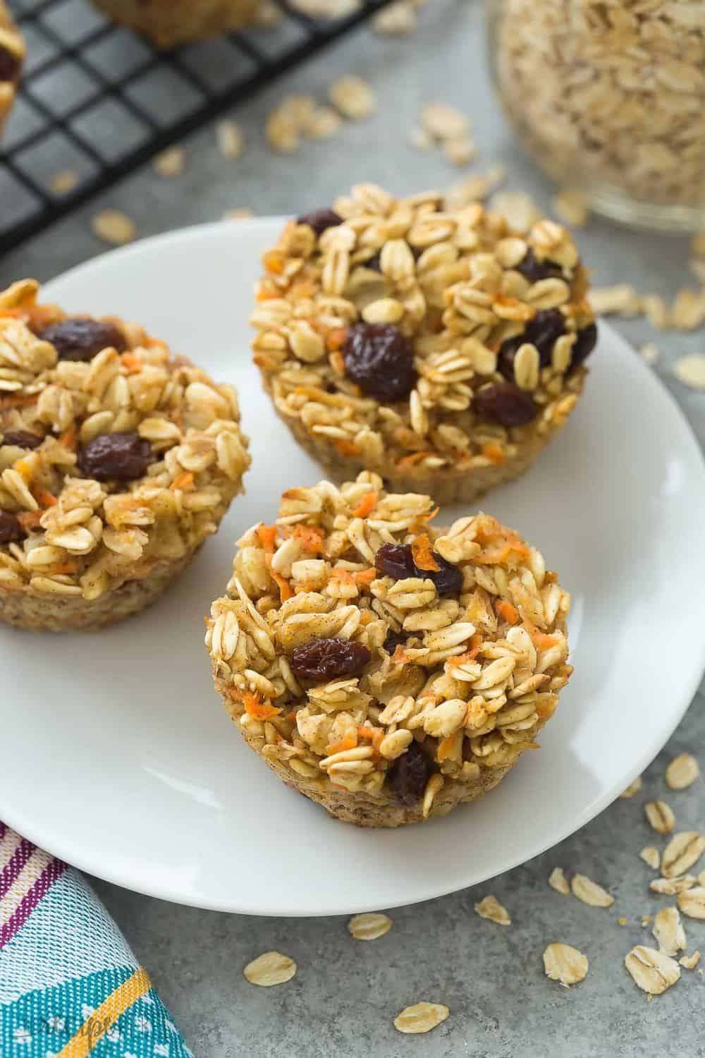 Carrot Cake Baked Oatmeal Cups on a white plate.