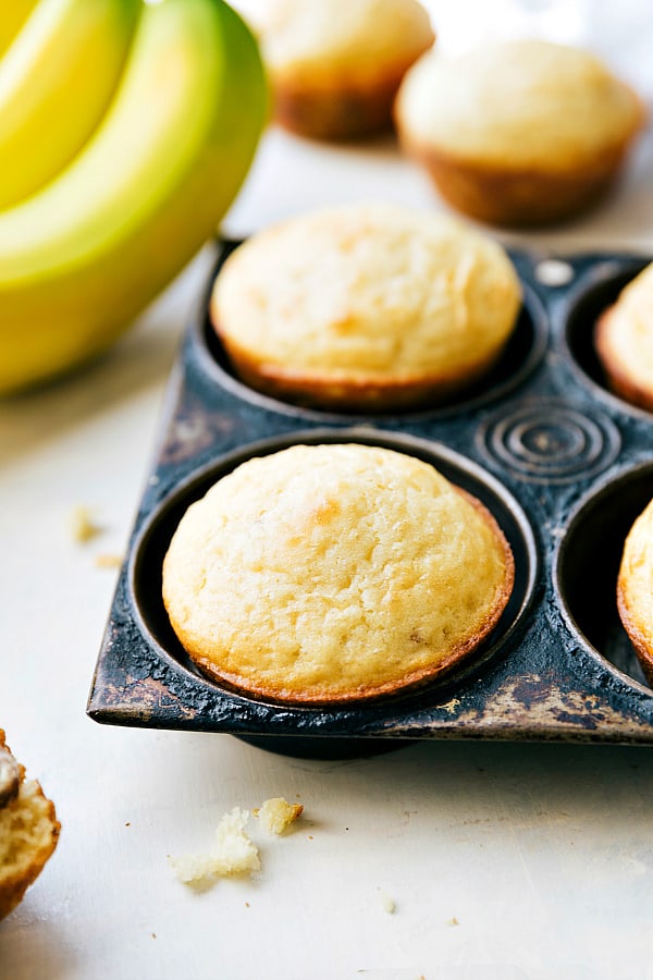 Sausage pancake muffins in a muffin pan.