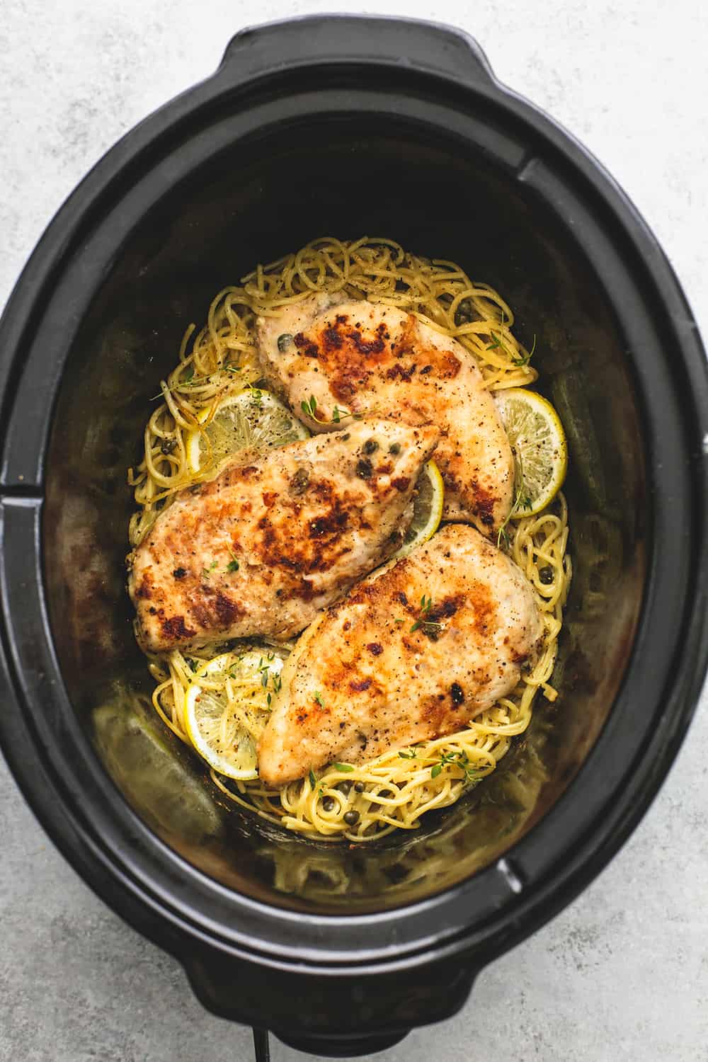 Lemon Chicken Piccata in a slow cooker.