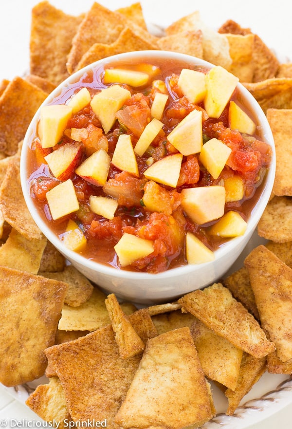 Fresh Fruit Salsa in a white bowl surrounded by chips.