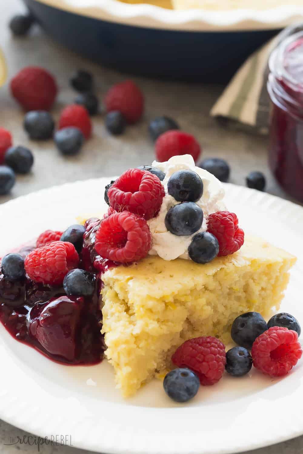 This Lemon Baked Pancake with Berry Sauce is such an easy breakfast for serving a crowd! Perfect for all your holiday brunches.