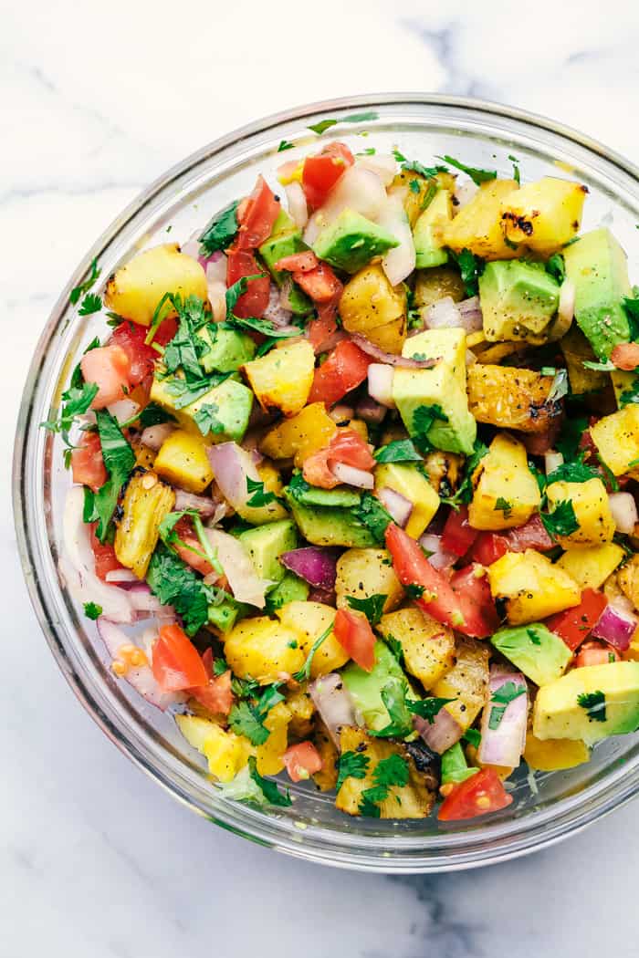 Pineapple Avocado Salsa in a clear bowl.