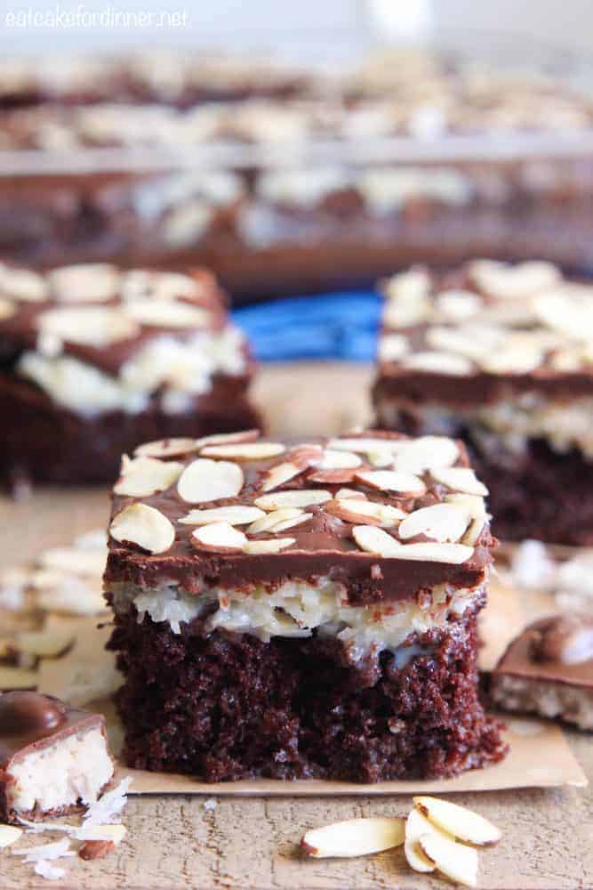 Slice of Almond Joy Poke Cake.