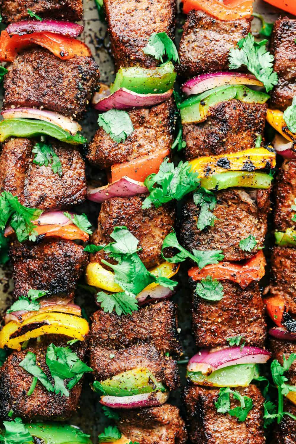 Grilled Steak Fajita Skewers with Avocado Chimichurri - 99