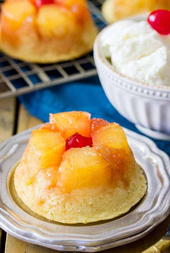 Easy, from-scratch, pineapple upside-down cupcake on a plate.