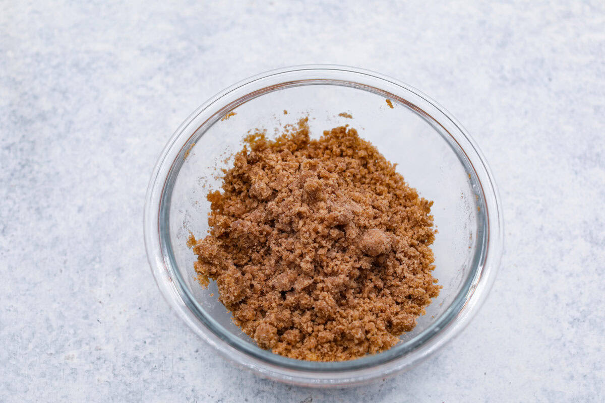 Fifth photo of the apple crumb topping mixed in a bowl.