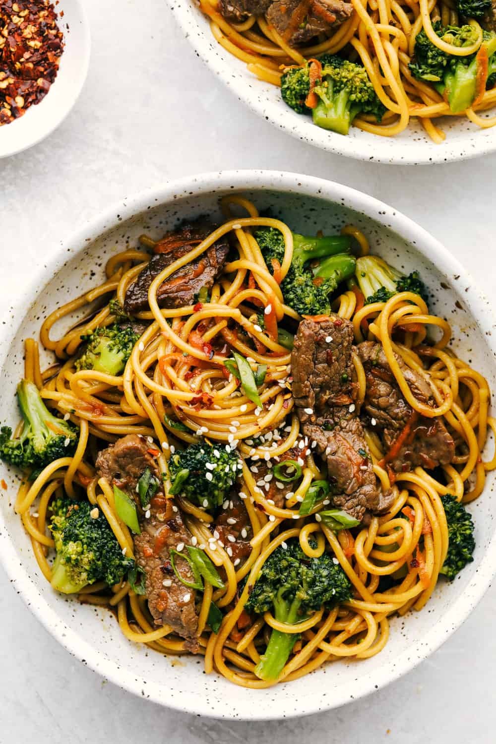 Beef and broccoli lo mein in a bowl. 