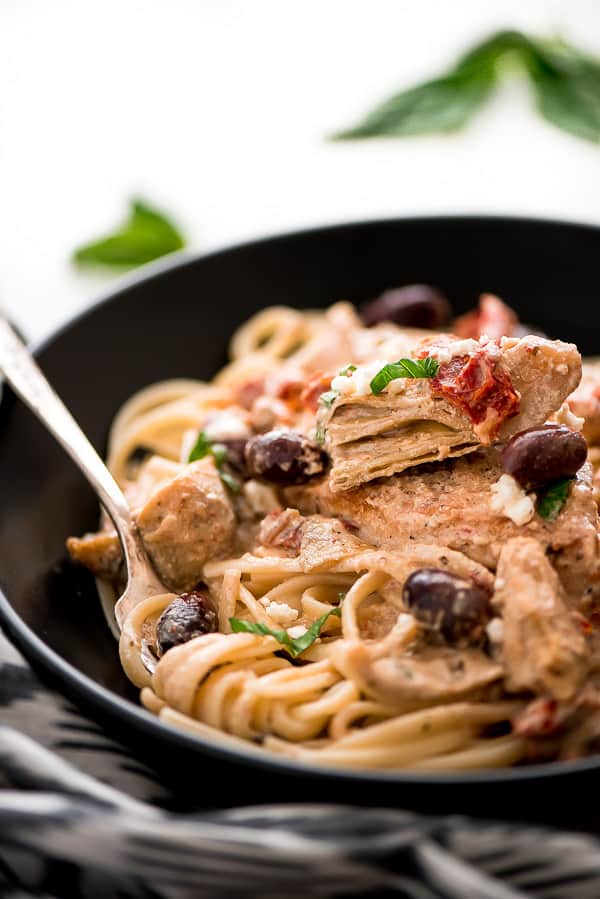 Creamy Mediterranean Chicken is a quick and easy comforting dish. It’s full of tender chicken, artichokes, kalamata olives, and sun dried tomatoes all robed in a delicious creamy sauce.