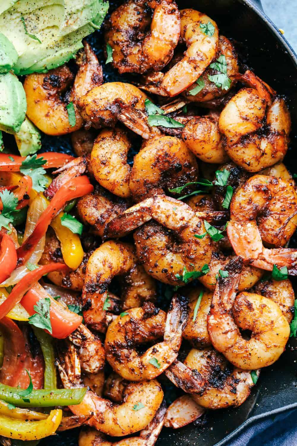 20 Minute Skillet Blackened Shrimp Fajitas in a skillet.