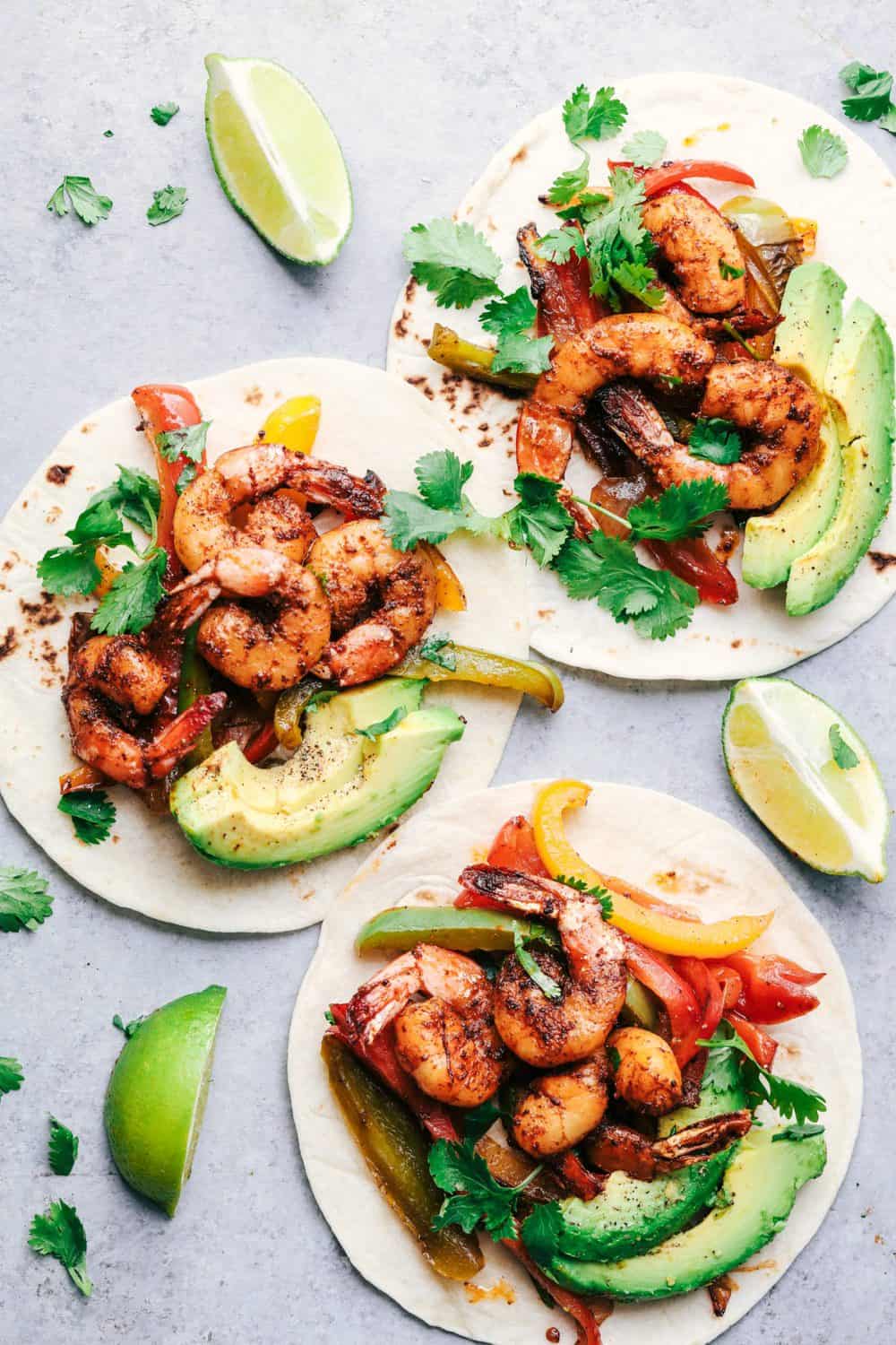 20 Minute Skillet Blackened Shrimp Fajitas opened up to show the ingredients inside.