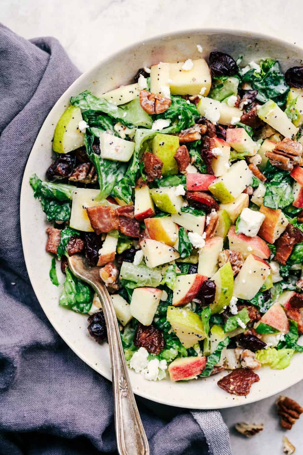 Autumn Chopped Salad with Creamy Poppyseed Dressing in a white bowl.