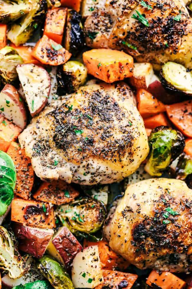 Close up of Roasted Garlic Butter Herb Chicken with Potatoes and Brussels Sprouts