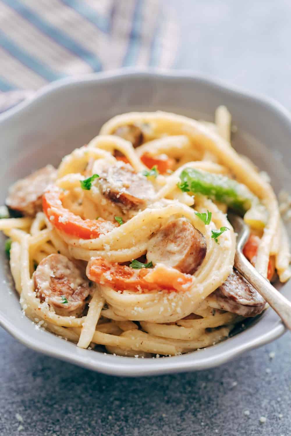 Creamy Cajun Sausage Linguine in a bowl.