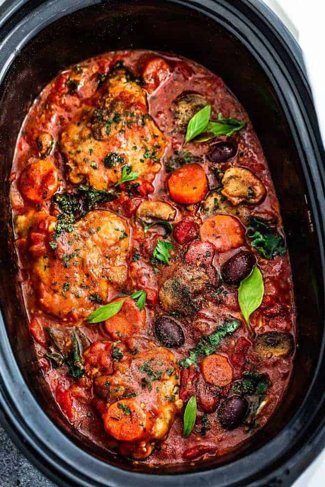 Slow Cooker Chicken Cacciatore cooking in a crock pot.