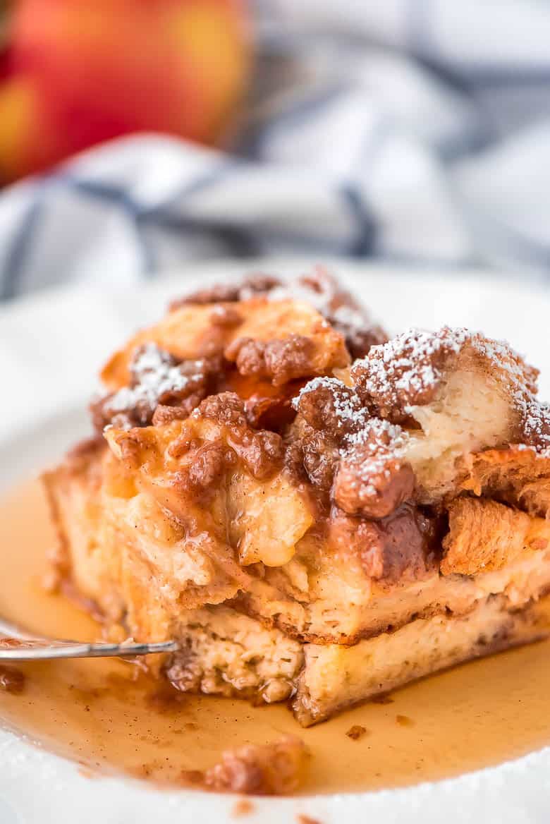 Overnight Cinnamon Apple French Toast Casserole on a white plate.