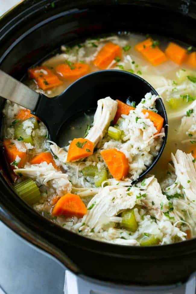 This slow cooker chicken and rice soup in a crock pot.