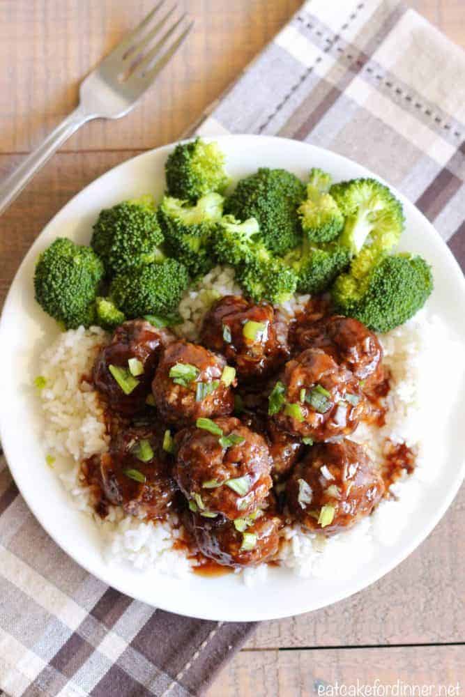Easy Teriyaki Meatballs with white rice, broccoli on a white plate.