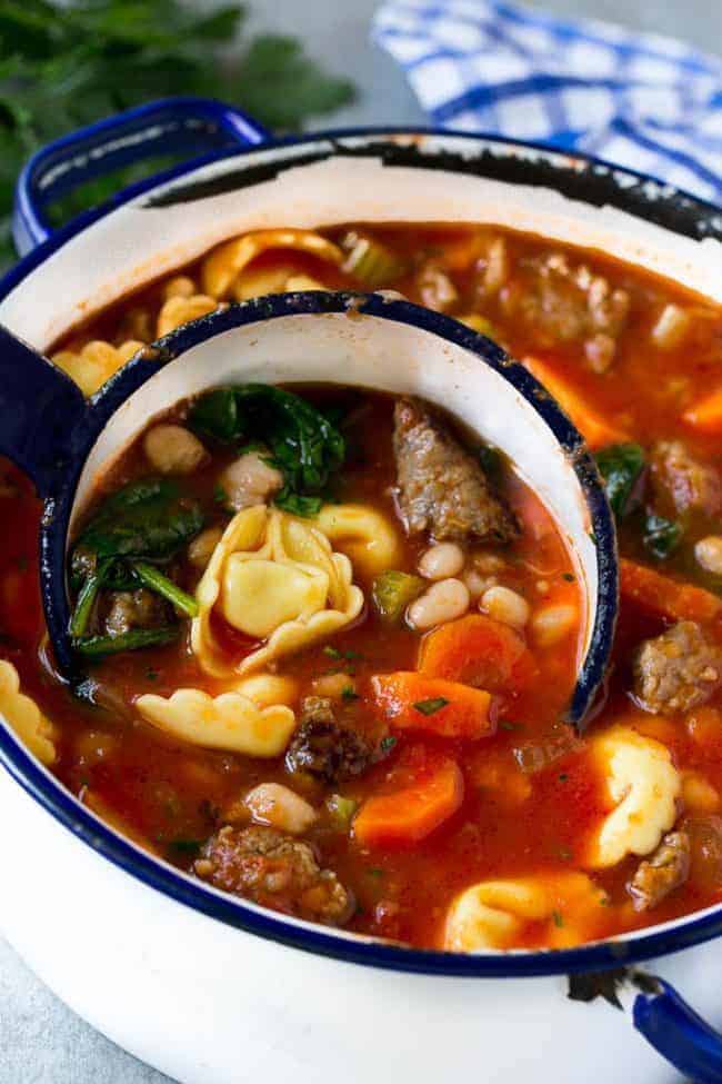 https://therecipecritic.com/wp-content/uploads/2017/09/tortellini-soup-with-sausage-2-650x975.jpg