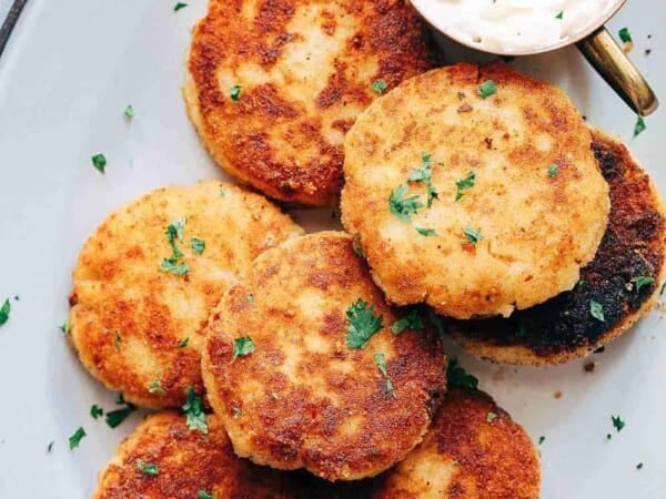 These ham mashed potato cakes are the most amazing way to use leftover mashed potatoes. They are incredibly cheesy and make for a delicious snack or appetizer!