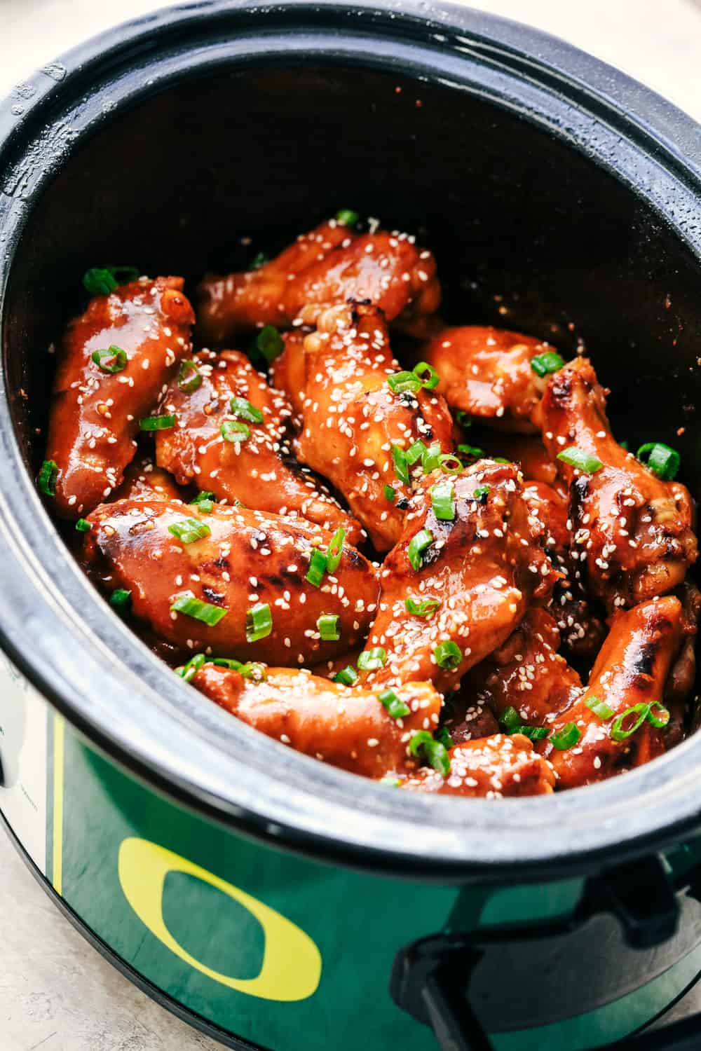 Slow Cooker Honey Garlic Sriracha Wings | The Recipe Critic