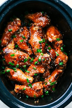 Slow Cooker Honey Garlic Sriracha Wings | The Recipe Critic