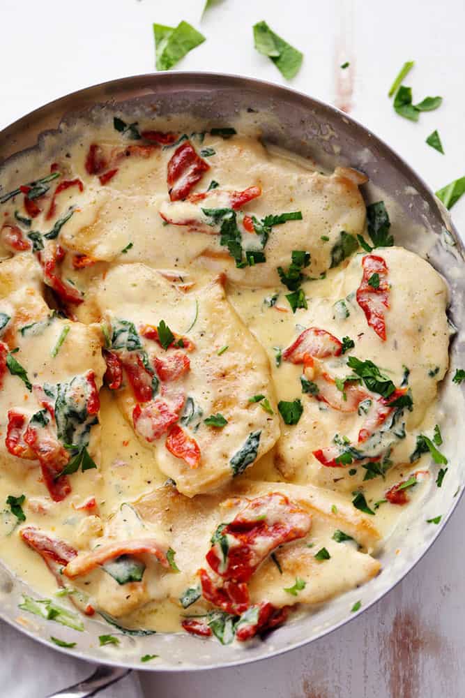 Creamy Tuscan Garlic chicken in a skillet.